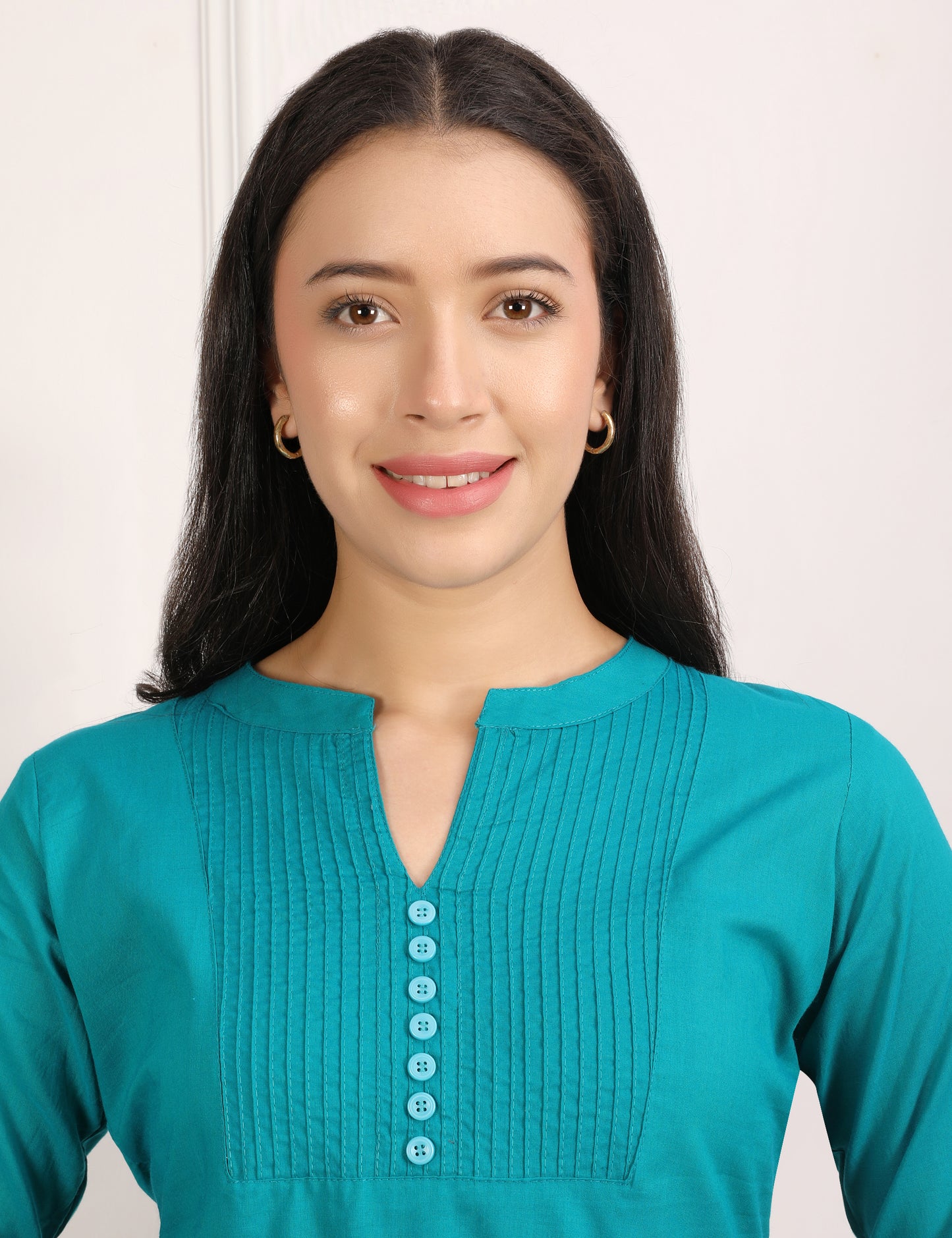 PEACOCK GREEN SOILD COLOUR SHORT KURTI